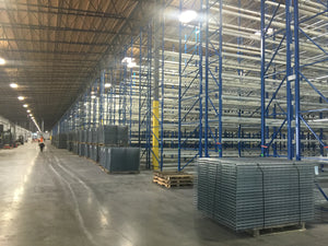 Wire mesh decks for pallet racking inside a large warehouse