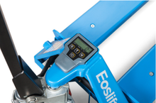 Load image into Gallery viewer, The digital scale on top of a manual hand pallet jack showing the weight in pounds and kilograms