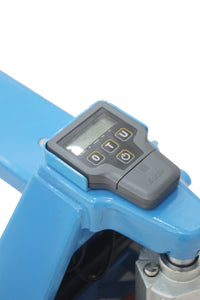 The integrated scale on a hand pallet truck showing the weight of a pallet on the forks